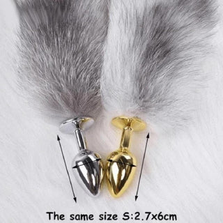 Presenting an image of Elegant Fox Tail Plug 19 Inches Long demonstrating the smooth surface and cool touch of stainless steel.