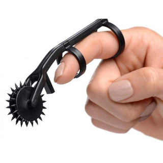 Dive into sensory play with this image of the Naughty Finger Wartenberg Pinwheel, a unique accessory for experiencing tingles, chills, and excitement.