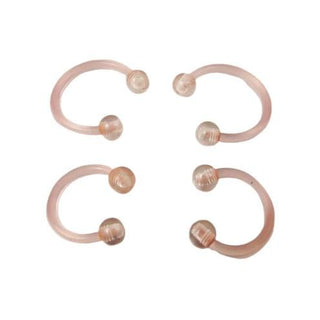 Check out an image of Comfy Horseshoe Plastic Nipple Rings Set, light pink color, crafted from bioplastic with an inner diameter of 0.31 inch and 0.39 inch, and ball stoppers measuring 0.12 inch.