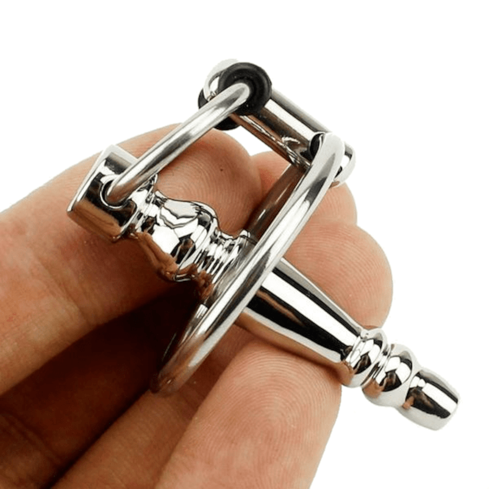 An intimate accessory for self-discovery and heightened pleasure, the Hollow Stainless Penis Plug With Cock Ring.