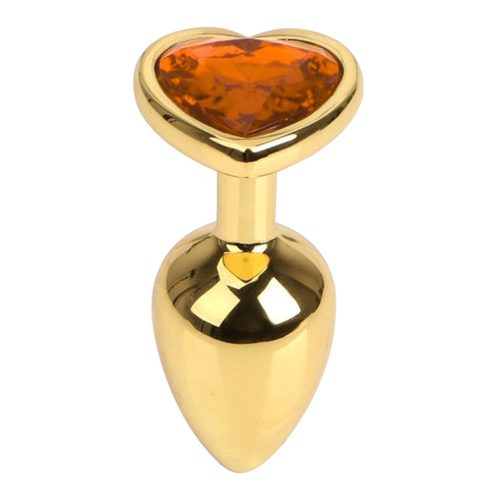 Presenting an image of Heart-Shaped Jewel Stainless Steel Gold Pretty Plug 2.76 Inches Long showing intricate design and compact size.