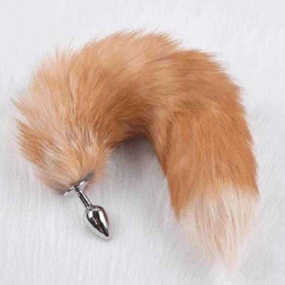 Take a look at an image of Elegant Fox Tail Plug 19 Inches Long with a bushy and flirtatious faux fur tail.