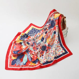 Check out an image of a colorful patterned scarf gag perfect for adventurous nights.