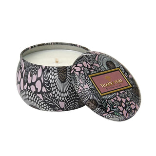 A mesmerizing play of colors in the container as the scented soy candle burns, adding to the overall aesthetic appeal.