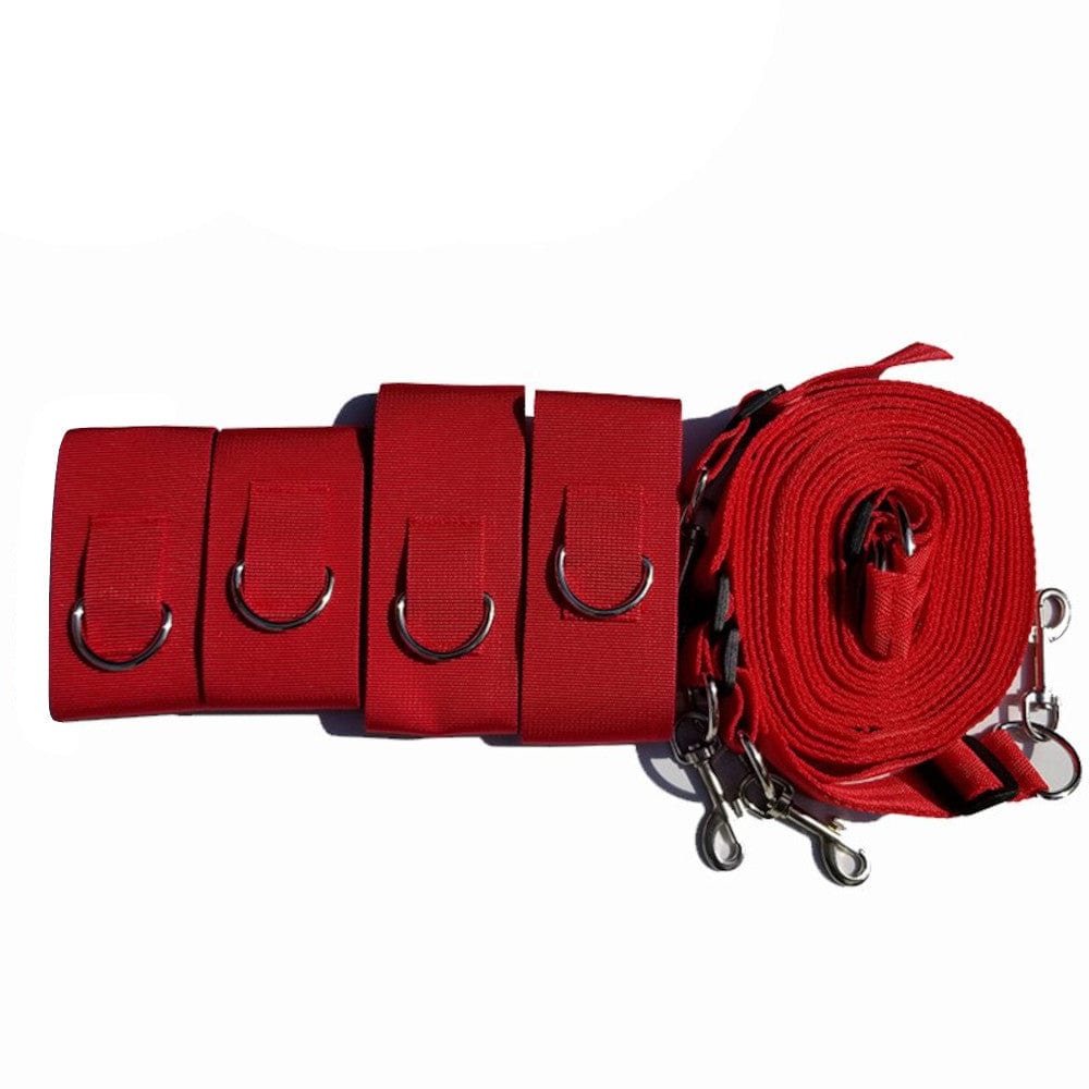 Passionate red bed restraints for igniting the spark in your relationship.