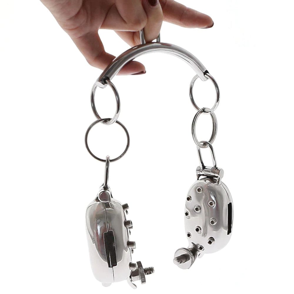 Stainless Ball Clamp CBT Torture Device with metal shells and hinges designed for pleasure and torment.