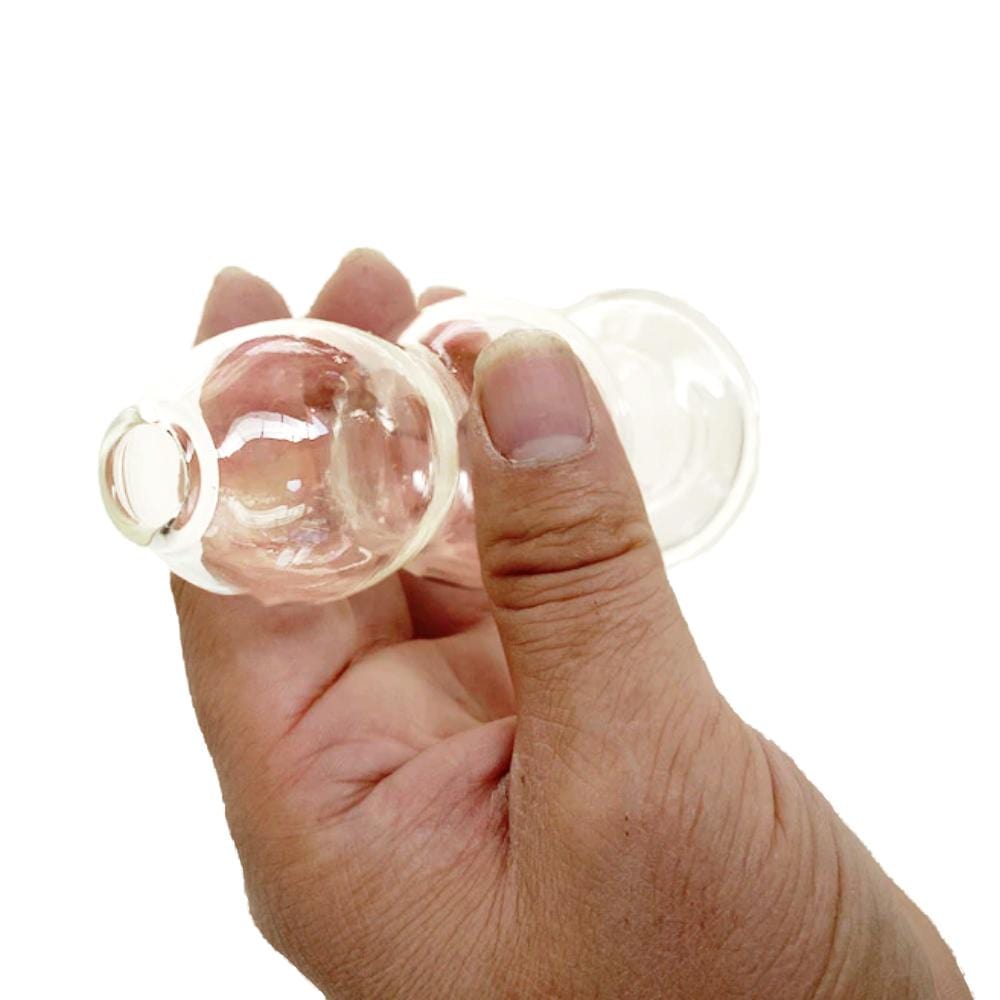 Feast your eyes on an image of Clear Glass Ass-Gaping Hollow Butt Plug 4.53 Inches Long made of safe-to-use glass for comfort and safety.