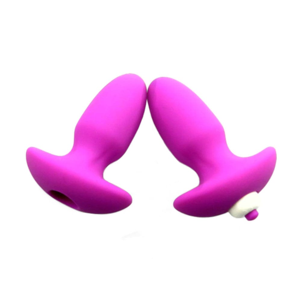 This is an image of the compact and sleek built-in vibrator of the Colored Hollow Silicone Vibrating Plug.