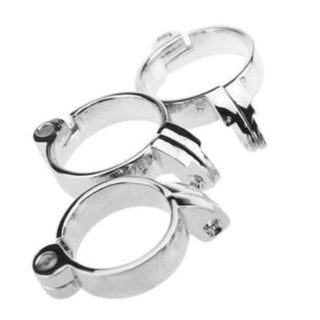 This is an image of Accessory Ring for Twice a Virgin Metal Cage showcasing interchangeable ring sizes for comfort.
