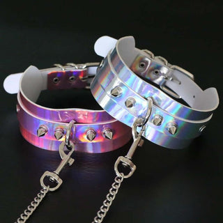 Displaying an image of En Vogue Holographic Collar emphasizing the need for regular cleaning with a soft brush or cloth to maintain its shine.