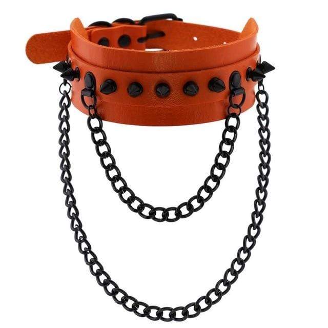 What you see is an image of Spiked Trendy Goth Choker in orange, crafted from premium materials for a daring and sultry play.