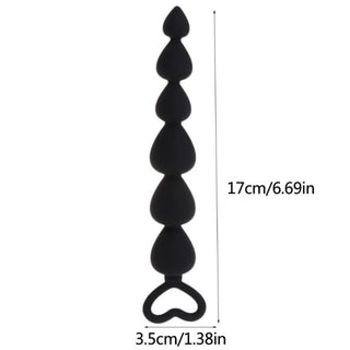 Observe an image of Pure Silicone Anal Beads for Beginners, a tool for intimate exploration and bonding.