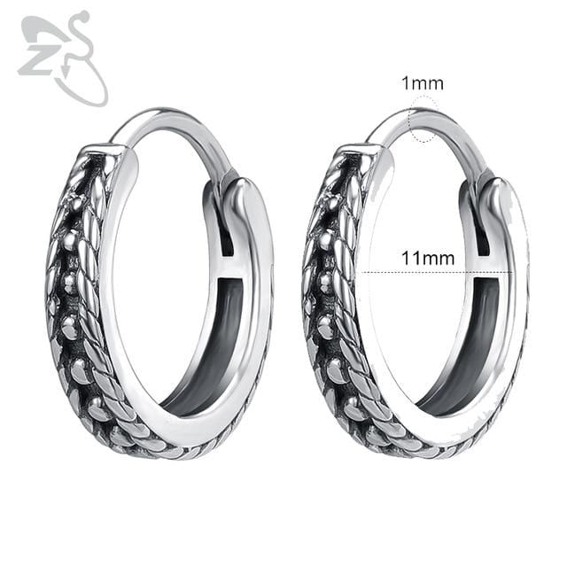 Check out an image of Rugged Stainless Guiche Rings made from superior stainless steel for hypoallergenic properties.