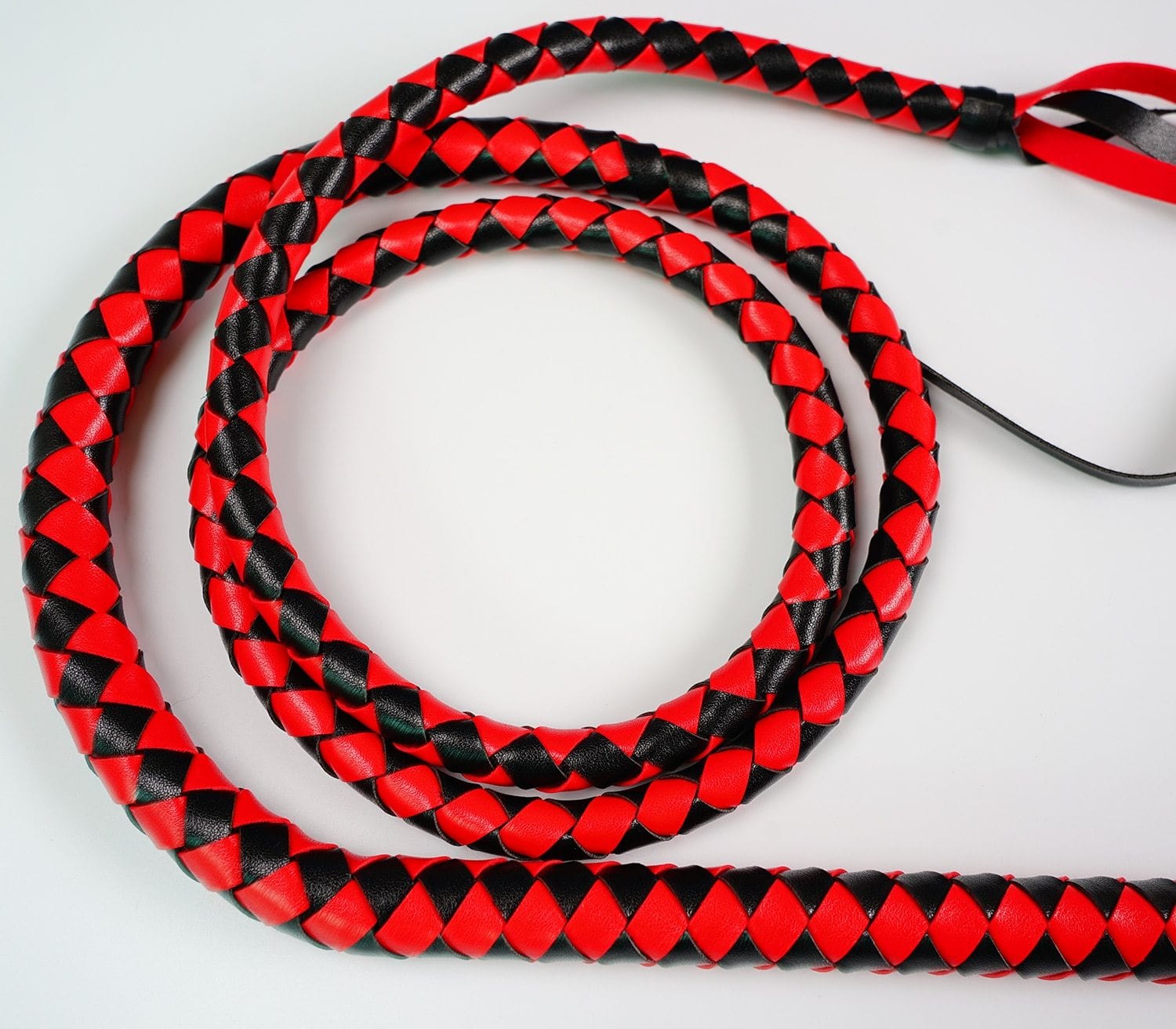 Here is an image of a meticulously crafted Genuine Cow Leather BDSM Whip, offering a blend of beauty and pain for thrilling play.