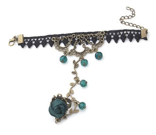 Image of a trendy charm bracelet with a lace charm, perfect for elevating your accessory game.
