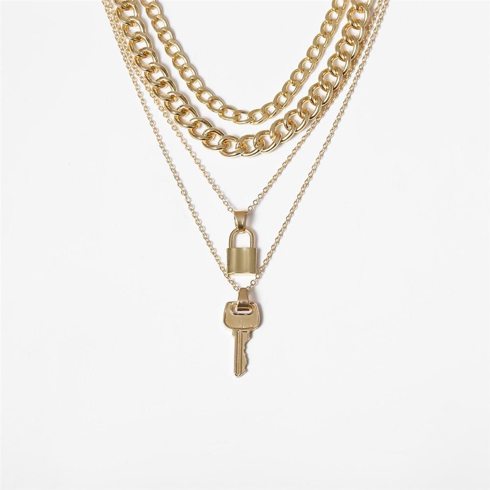 What you see is an image of a gold Multi Layer Lock and Key Necklace Set with geometric pendants made from zinc alloy.