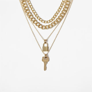 What you see is an image of a gold Multi Layer Lock and Key Necklace Set with geometric pendants made from zinc alloy.