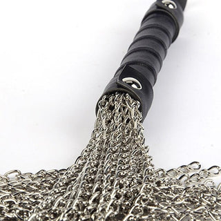Metal flogger with 15.75-inch tails and 6.10-inch handle for BDSM impact play.