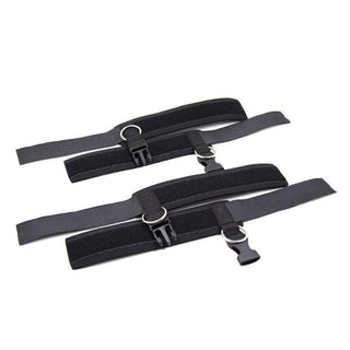 A set of four bondage restraints with adjustable Velcro belts for secure wrist and ankle play.