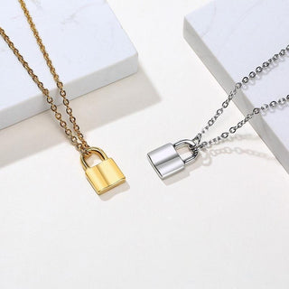 Displaying an image of Tiny Lock Chain Necklace, a stainless-steel pendant necklace with a unique geometric design for bold fashion statements.