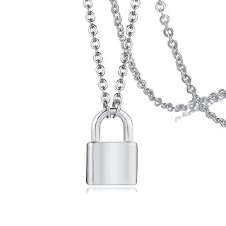 Check out an image of Tiny Lock Chain Necklace, a robust and reliable accessory for expressing bold, edgy style.