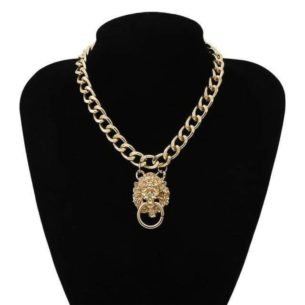 Check out an image of a Golden Lion Collar Necklace, a regal gold-colored choker adorned with a lion-devouring-o-ring pendant.