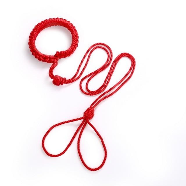 Check out an image of Slave Domination Beginner Silk Cotton Kinky Ankle Rope in red and flaxen colors with collar segment for versatile bondage scenarios.