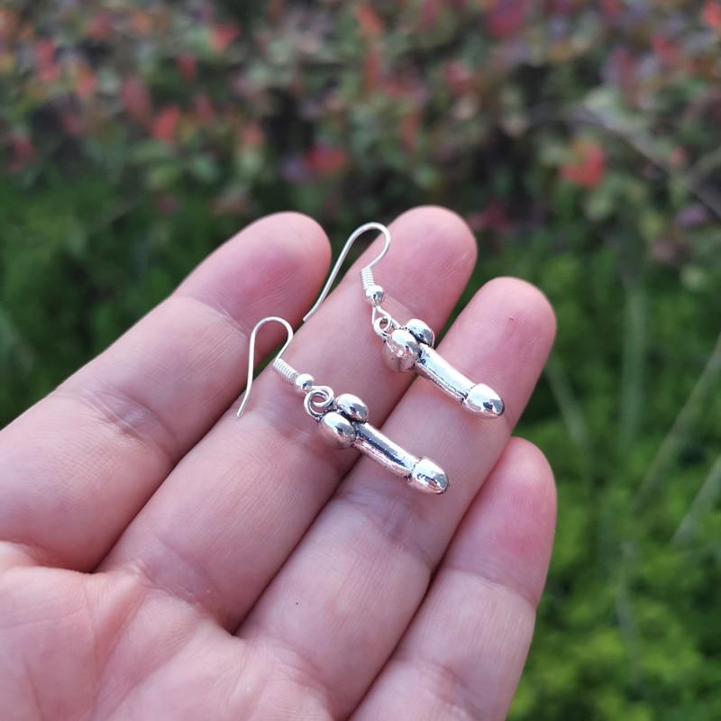Featuring an image of Penis Earring Fetish Jewelry featuring a vintage animal-shaped design for a bold and elegant look.