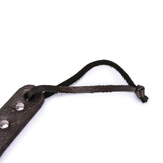 Pictured here is an image of the 2.4 inches wide BDSM impact play device with a visually stimulating design for intimate play.