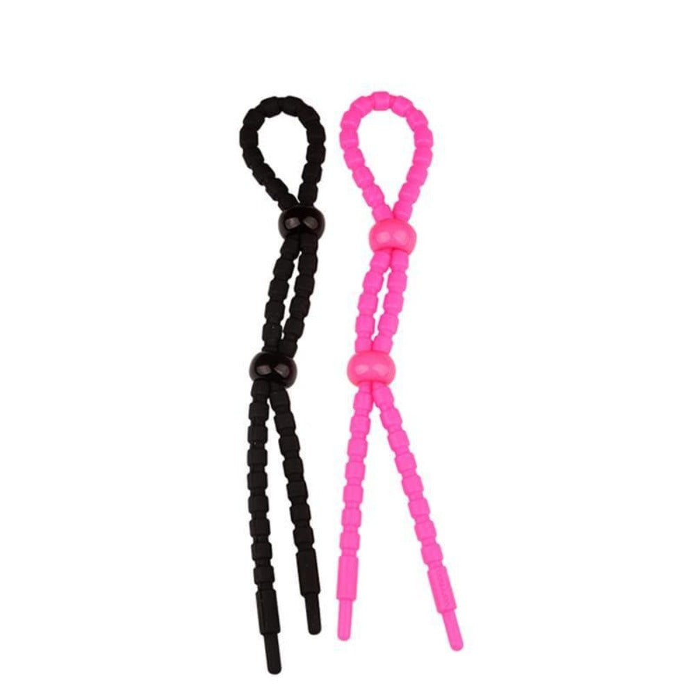 Presenting an image of Threaded CBT Ball Tie Bondage in pink and black silicone material, measuring 7.68 in length, 0.39 in width and thickness.