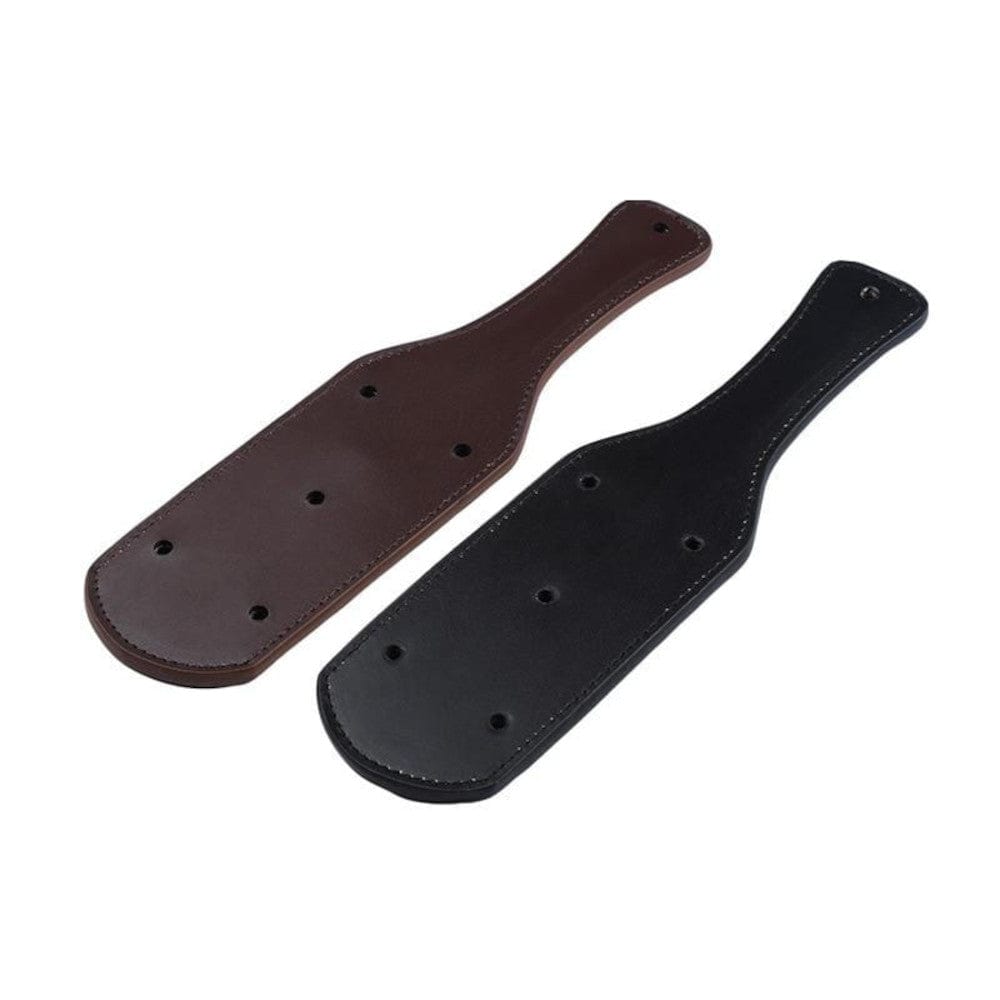 Observe an image of Badass Leather Spanking Paddle, available in black and brown colors for a customized BDSM experience.