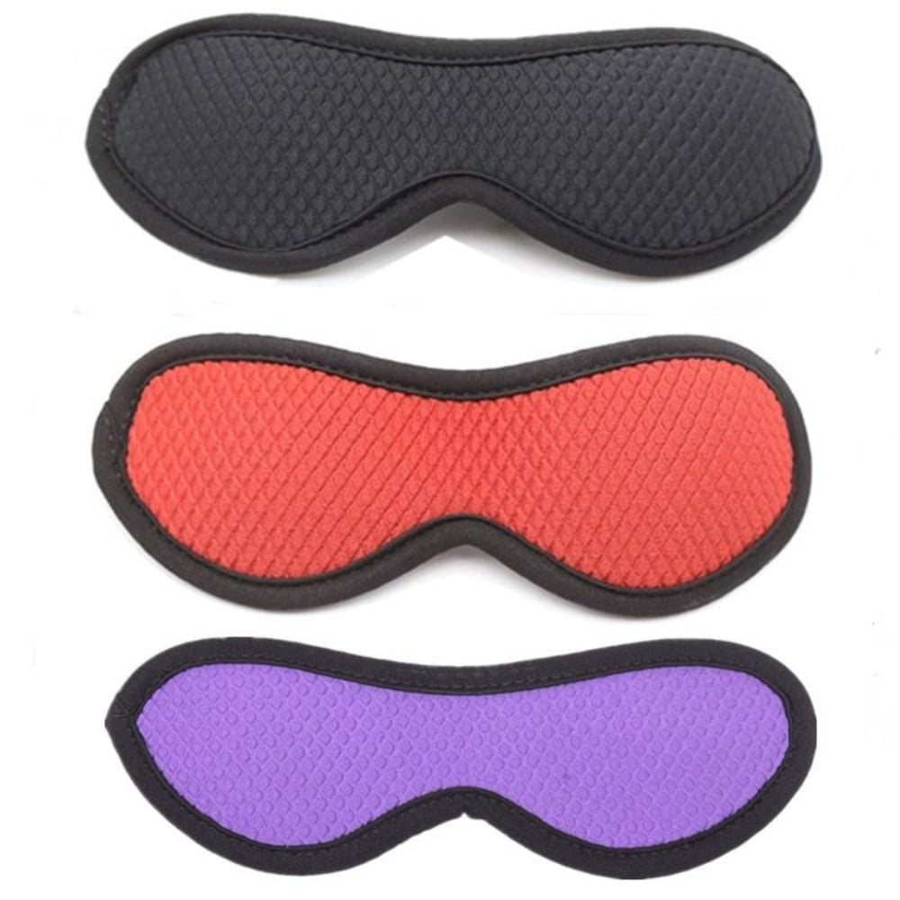 Blindfold fetish toy in luxurious purple nylon fabric for sensory deprivation play.