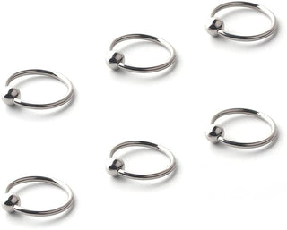 Displaying an image of Surgical Grade Frenum Ring Piercing with central bead for added stimulation, made from hypoallergenic 316L Surgical Stainless Steel for comfort and safety, available in various sizes.