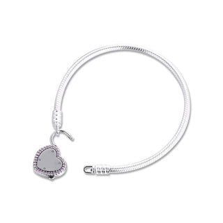 Trendy bracelet with heart charm, showcasing delicate design and durable construction.
