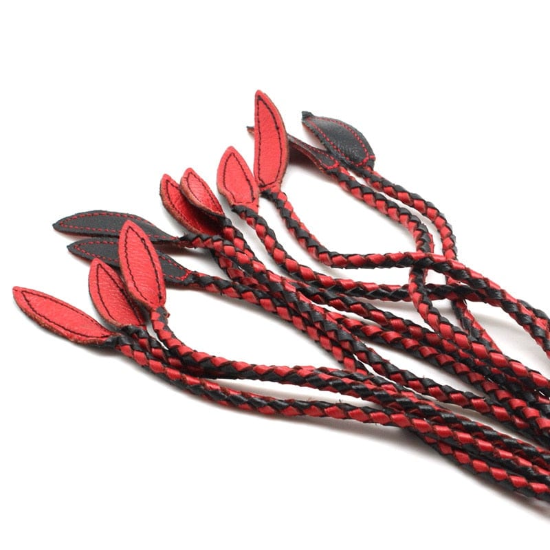 This is an image of Super Long Floggers Cowhide Leather Whips Toy, designed for extended reach and control with unique braided design for varied sensations.