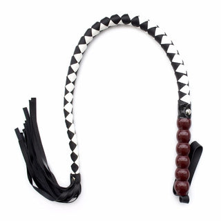 BDSM whip with black and white intricate braided design, 34.65 inches in length, ideal for power play and impact.
