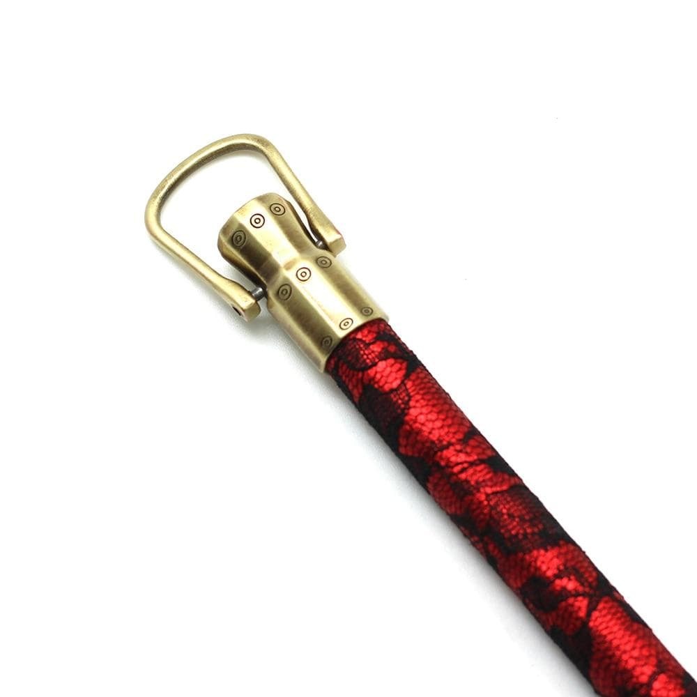 Discover new pleasures with a spreader bar designed for passionate experiences in red and black colors.
