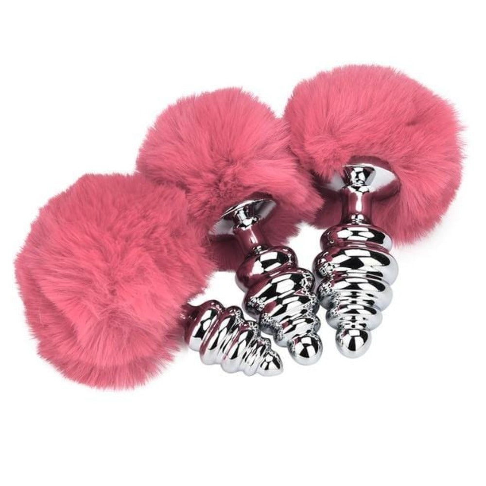 Pictured here is an image of Ribbed Aluminum Bunny Tail 3pcs Butt Trainer Set in purple color with medium size plug.