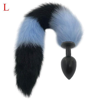 In the photograph, you can see an image of Mythical Blue Wolf Tail Plug, a high-quality metal plug with a synthetic fur handle in medium size.