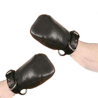 A close-up image of adjustable Pet Play Mittens made from premium leather with metal D-rings for creative play.