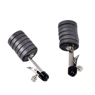 You are looking at an image of Magnetic Discs Weighted Nipple Clamps, crafted from premium stainless steel and magnet for durability and comfort.